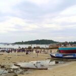 ATRAKSI WISATA MENURUNKAN BOAT DI DESA TANJUNG BINGA